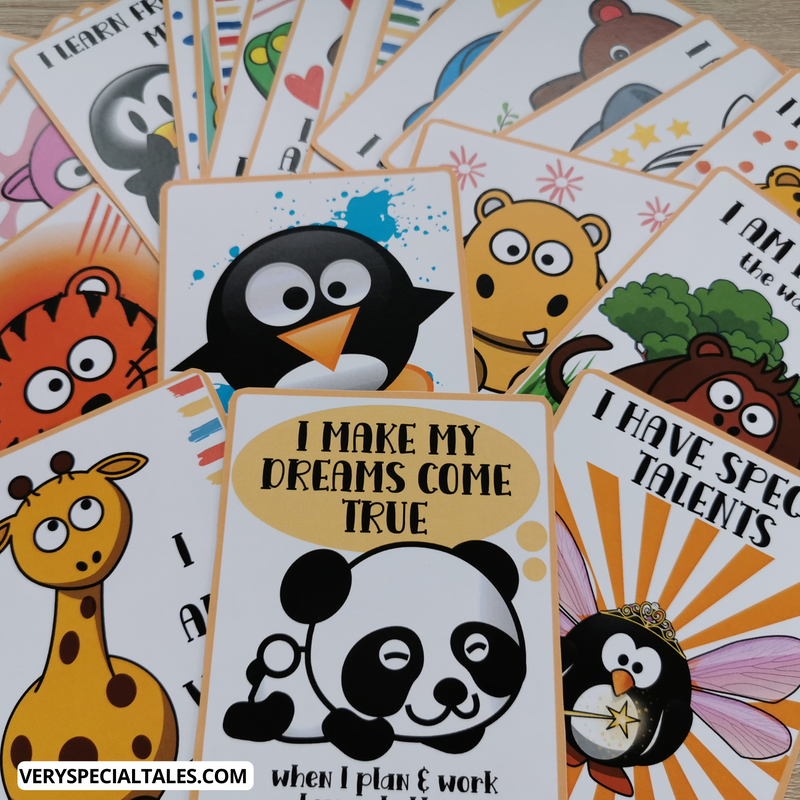 A pile of Affirmations cards containing playful illustrations of animals, including penguins, a giraffe and hippopotamus, alongside affirmations for children.